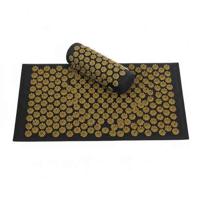 Tapis et rouleau d'acupression noirs avec pointes en forme de fleurs dorées pour relaxation et bien-être